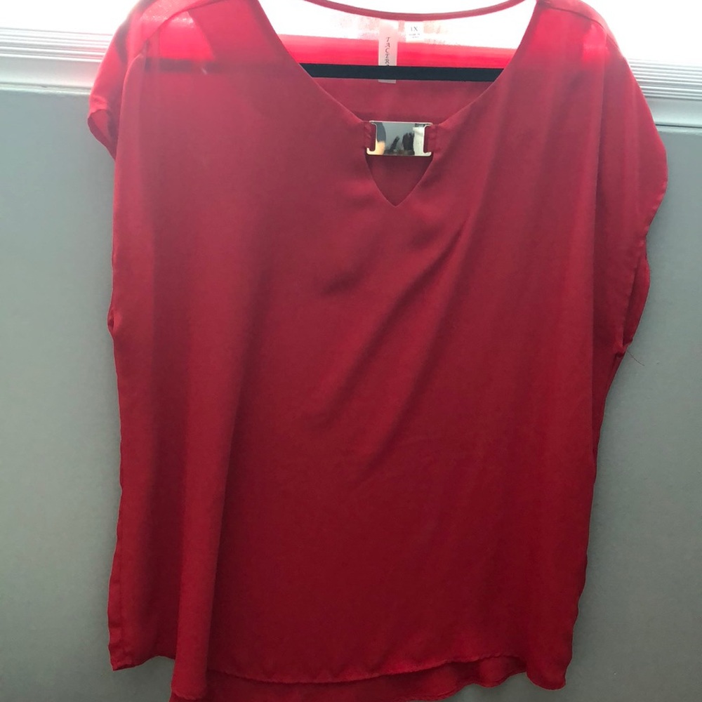 Red blouse with gold buckle